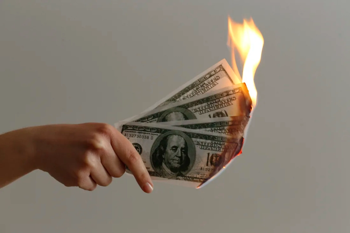 Dollars burning